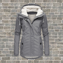 Winterjas met capuchon voor dames | Sluiting met knopen en rits