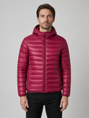 Man in burgundy lightweight padded jacket with hood, front view